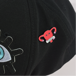 Gorra Ojos con Pin